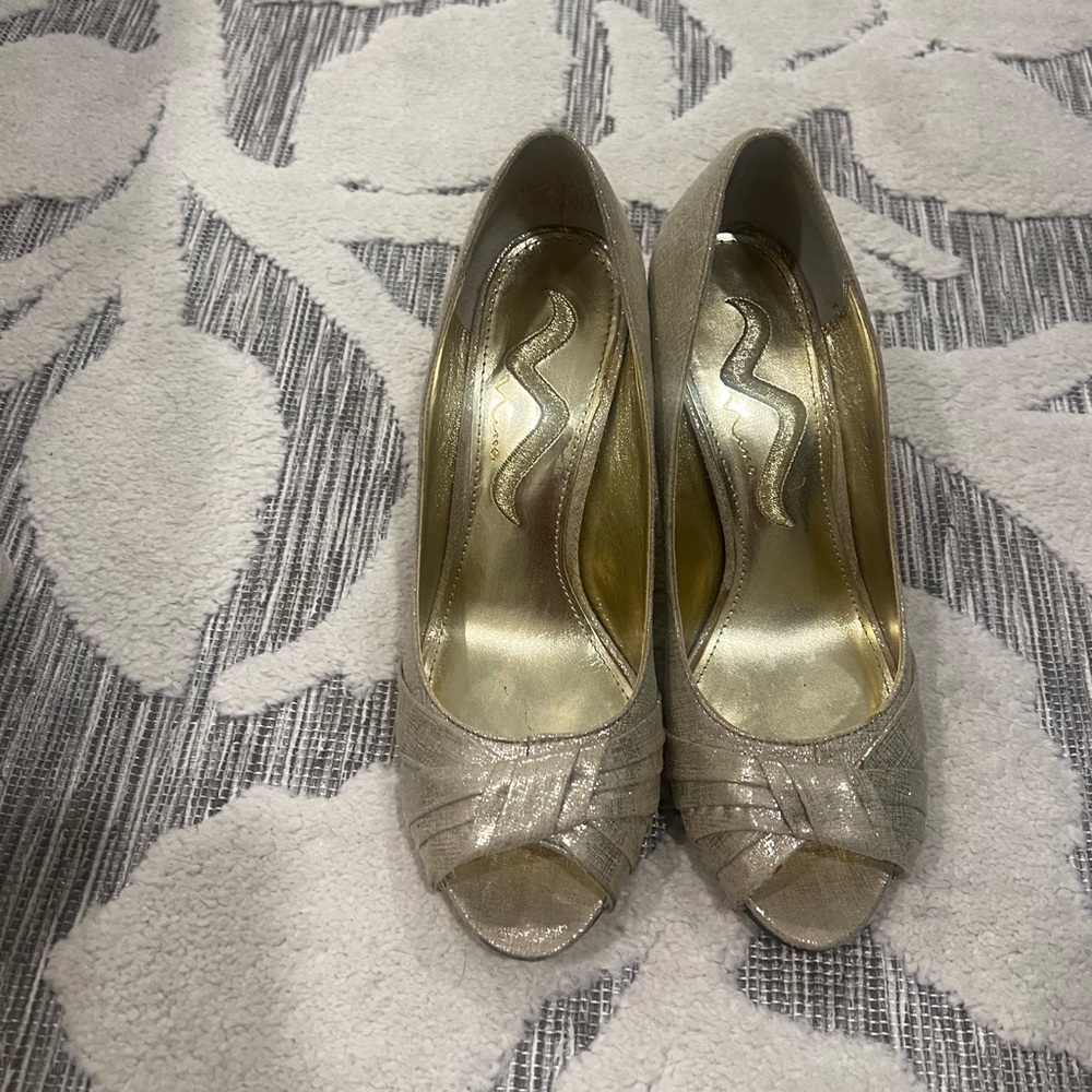 Nina Shimmering Gold Peep-Toe Heels
Worn twice to weddings